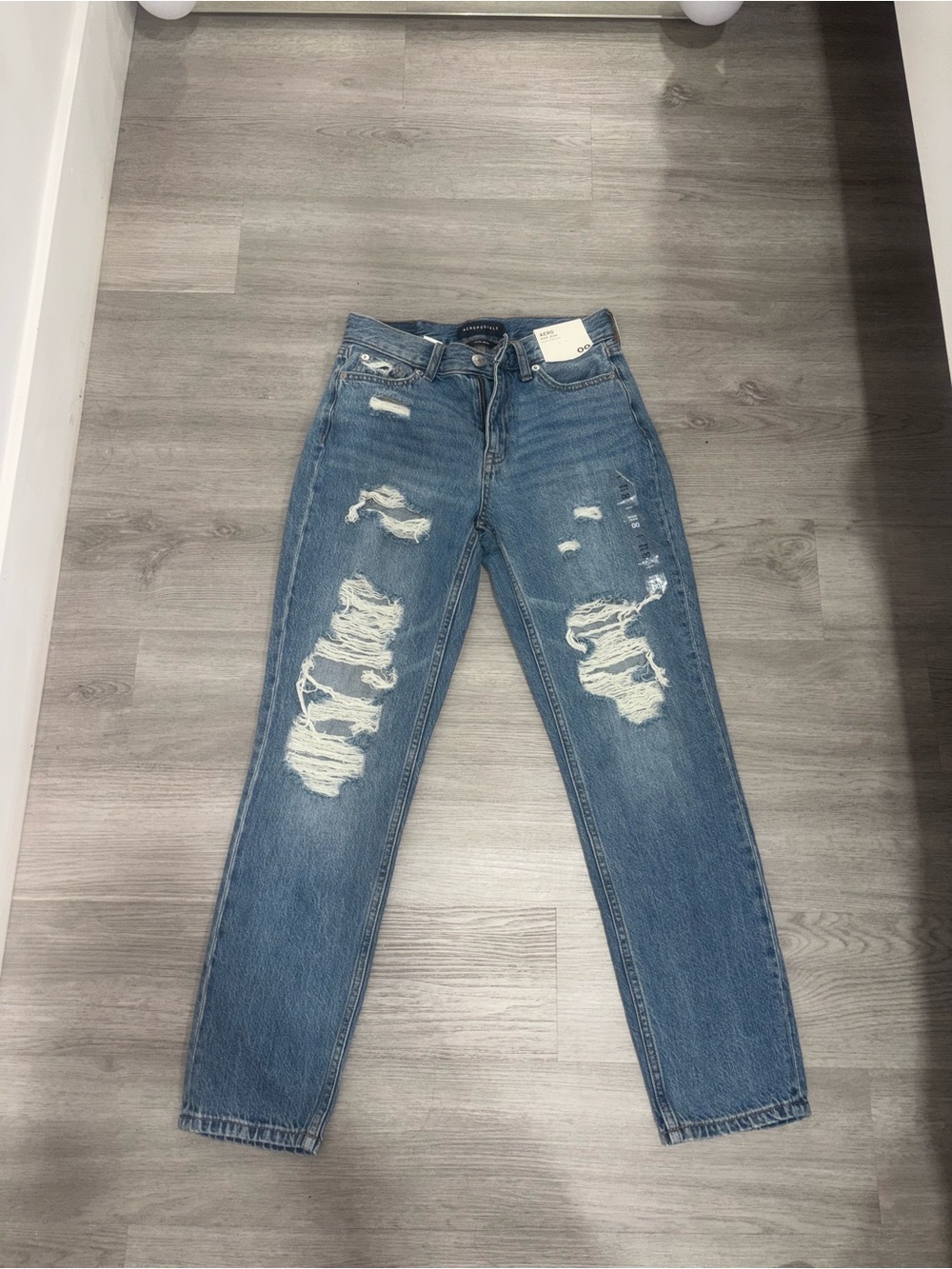 Women's Distressed Blue Jeans